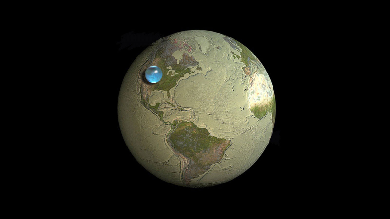 Illustration for article titled El volumen de todo el agua y aire del planeta, comparado con la Tierra